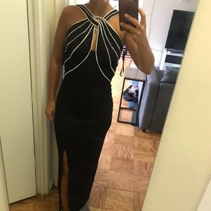 Gorgeous black dress. Perfect for wedding guest. Fits like size 0-2.